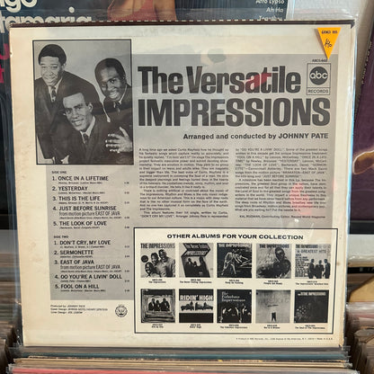 The versatile impressions - arrange and conducted by Johnny rate